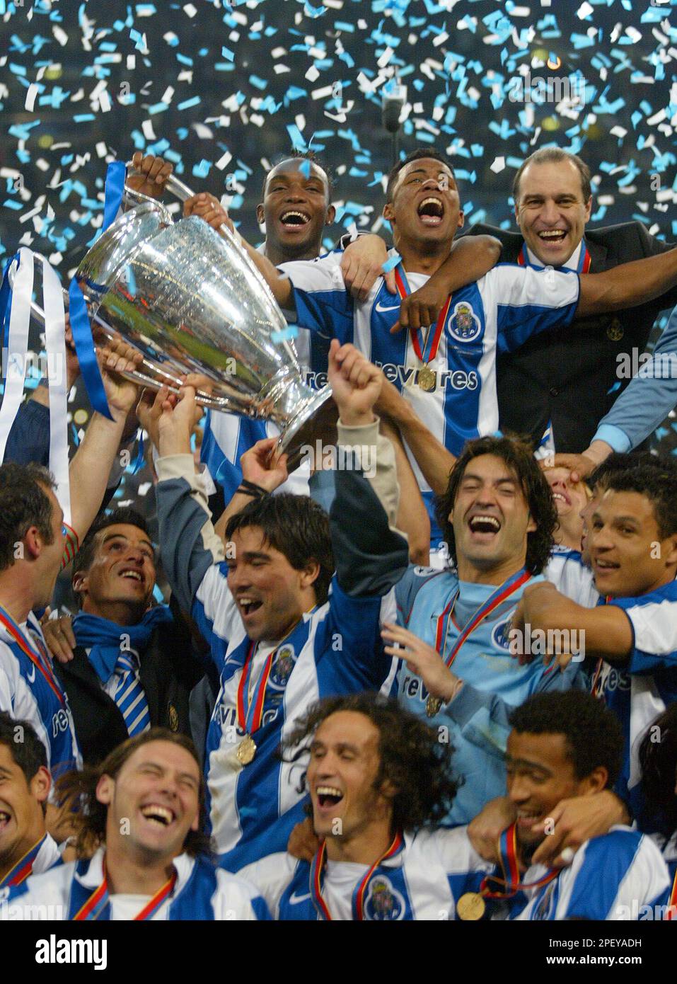 Porto players celebrate as they lift the trophy after beating