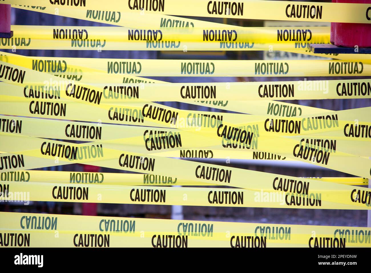 Tape blocking entrance two a dangerous situation Stock Photo Alamy