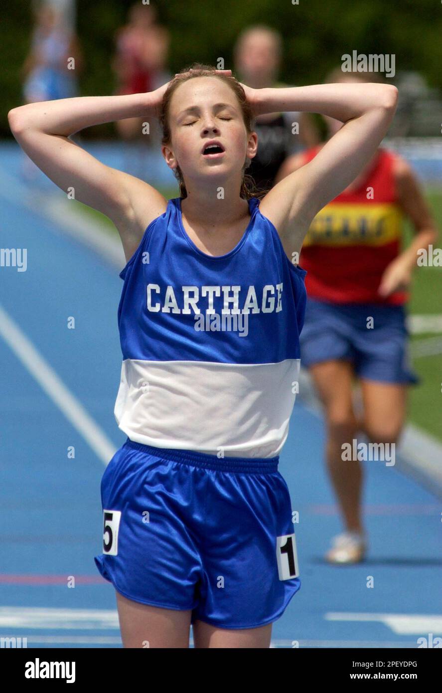 Carthage's Katelyn Bastert wins the Class A 3,200 meters at the IHSA