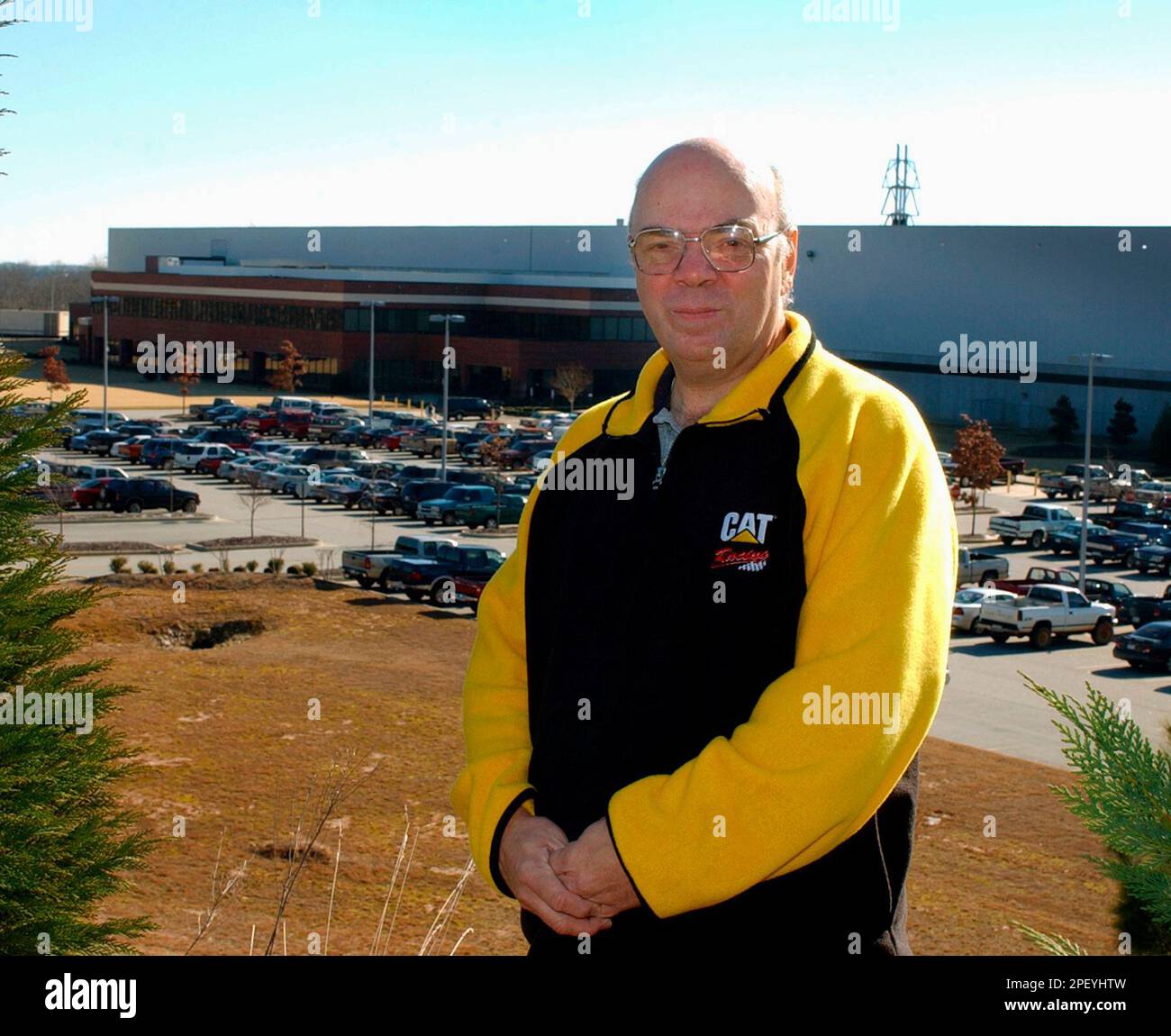 Tom Smith poses in front of the Caterpillar&rsquo;s Griffin Power 