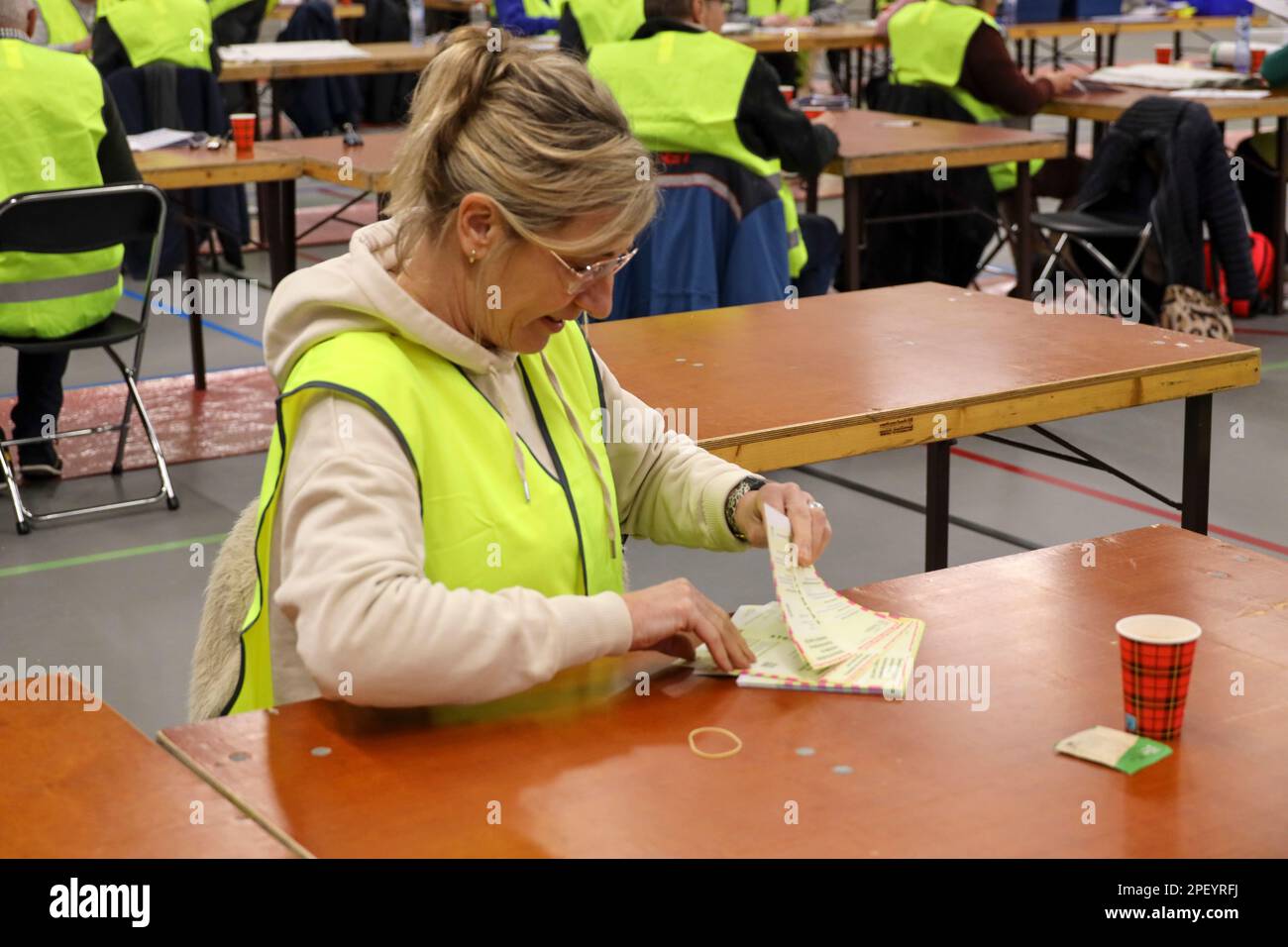 Netherlands-March 15th, Provincial and waterboard elections with Voluntary counters in sports hall to count votes in Zuidplas Stock Photo