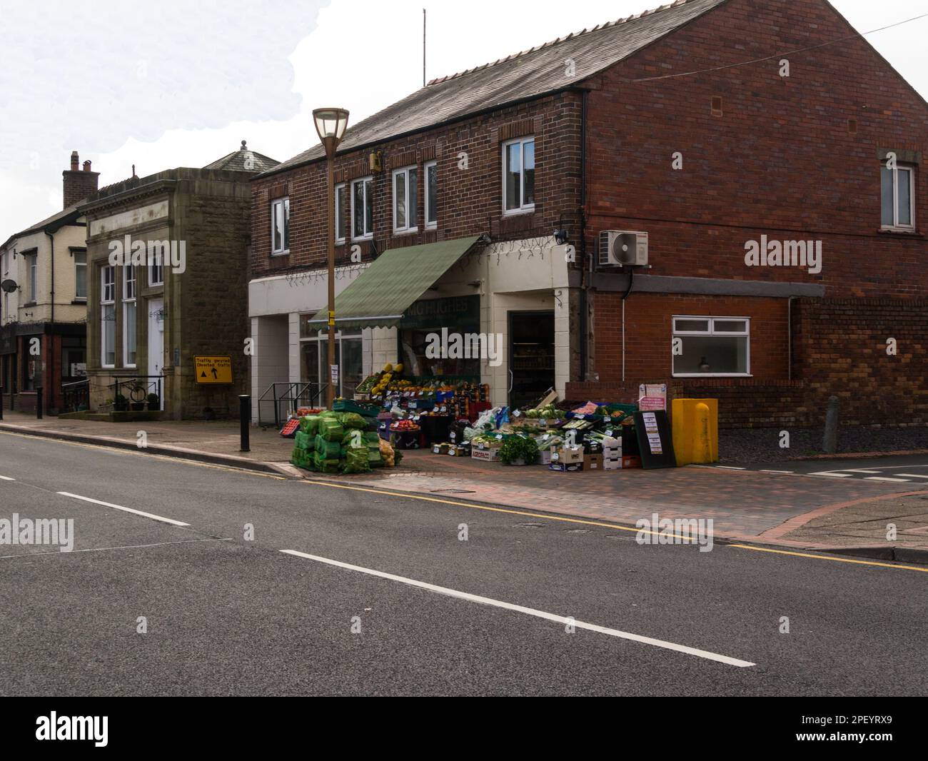 Grocer with huge selection of fresh fruit and vegetables in Church Street Chirk North Wales UK Stock Photo