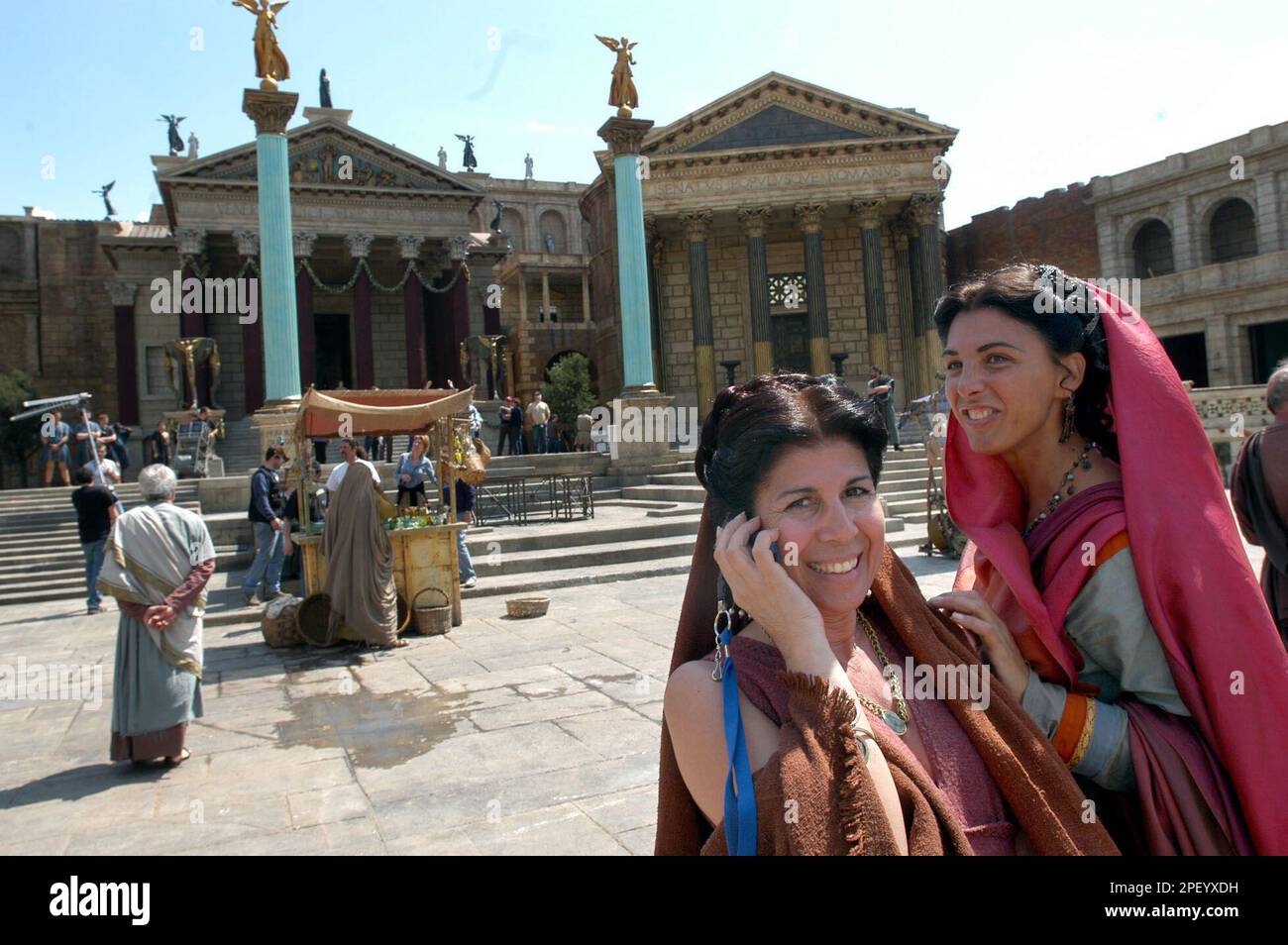 Savina Rotundo, left, and Maria Pia Morano, extras acting the role of noble  women, have a break during the filming of a new drama series "Rome", set in  51 BC, in Rome's