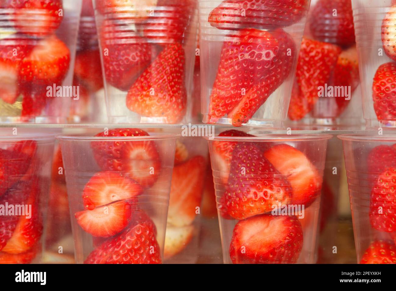 Plastic Glasses With Strawberries Stock Photo Alamy