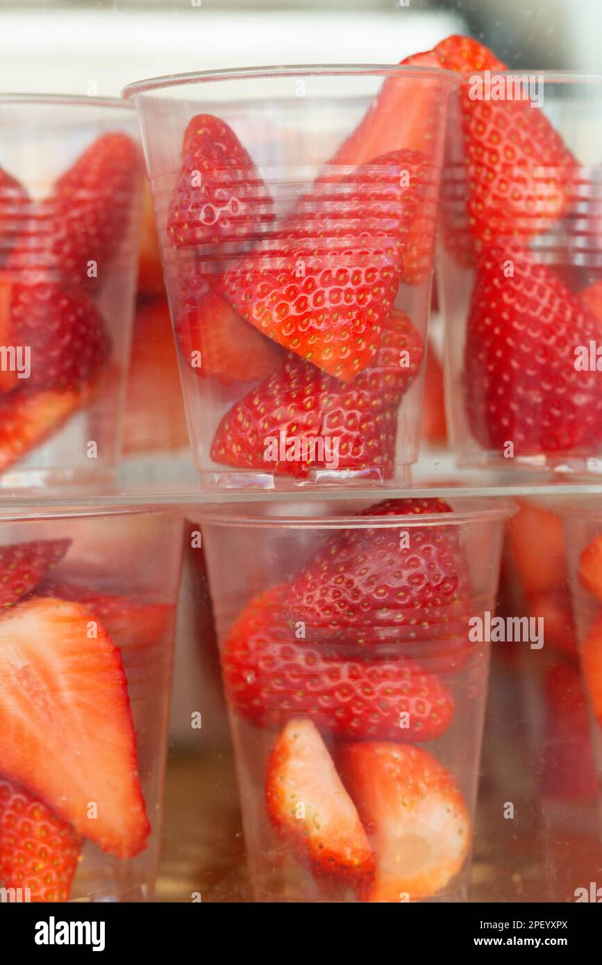 Plastic Glasses With Strawberries Stock Photo Alamy