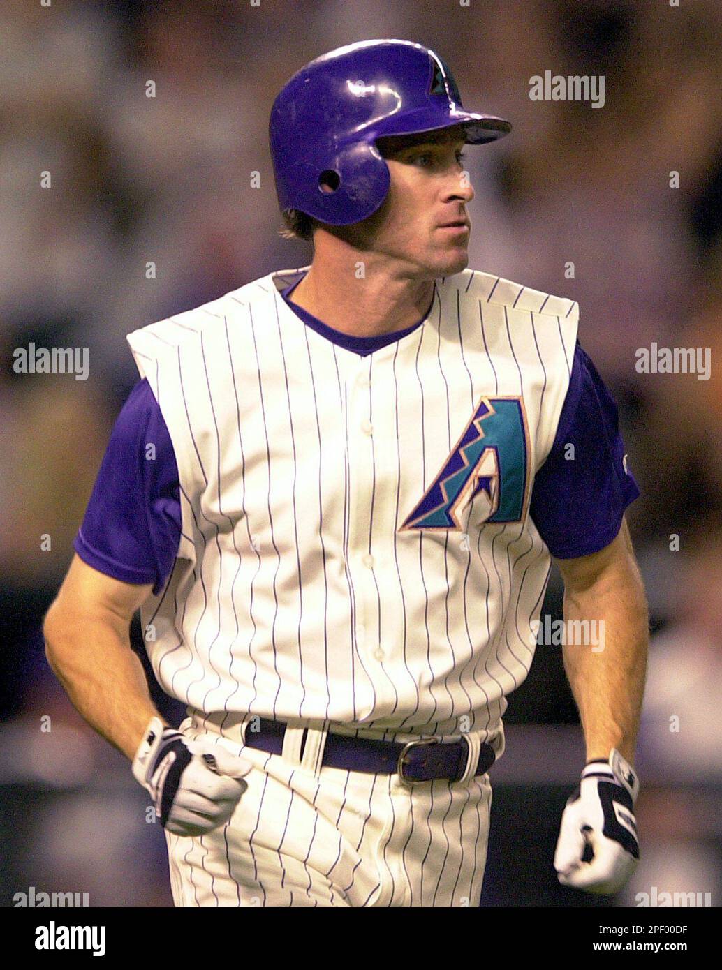 Arizona Diamondbacks' Steve Finley watches his hit leave the park for a  solo home run off Philadelphia Phillies pitcher Vicente Padilla during the  fourth inning Friday, May 7, 2004, in Phoenix. (AP