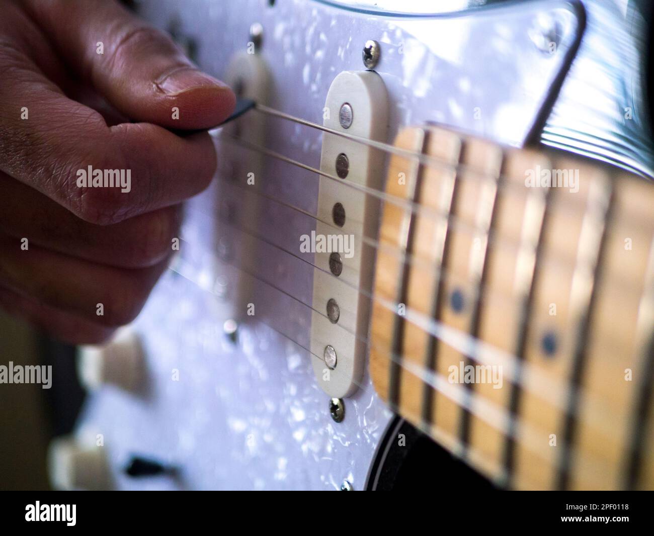 Man playing guitar close-up Stock Photo
