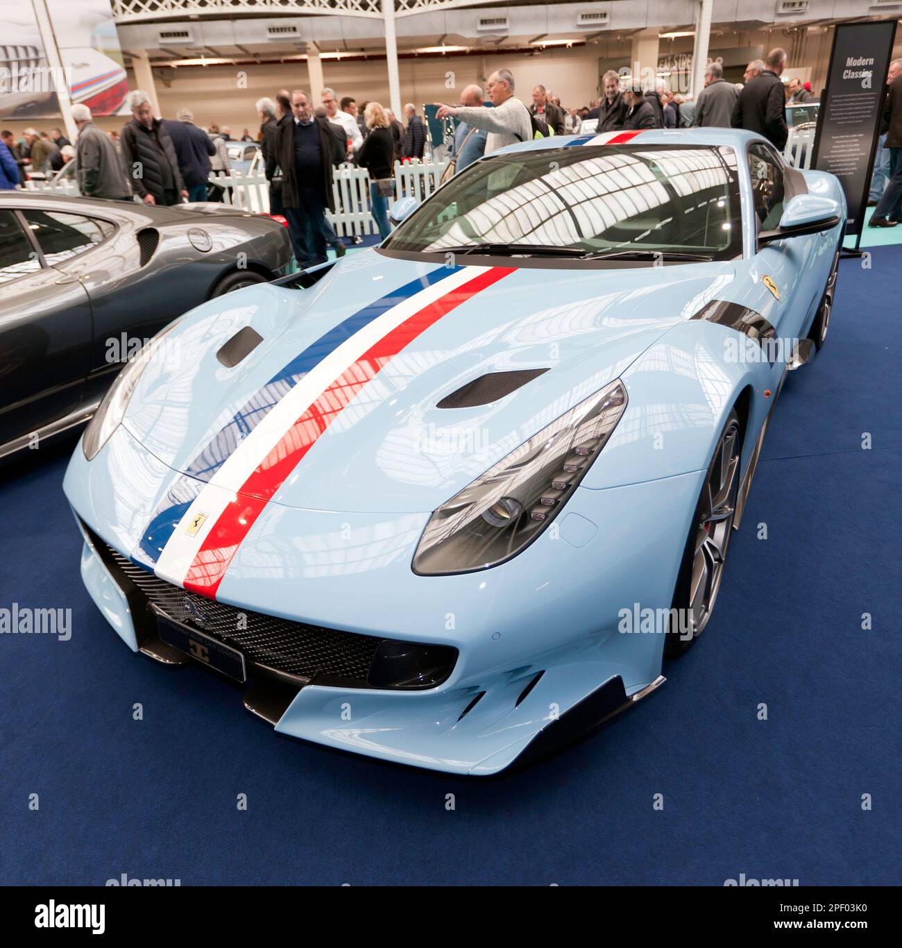 Three-Quarters Front view of a 2017, Ferrari F12 TdF,  on display in the Modern Classic Area, of the 2023 London Classic Car Show Stock Photo
