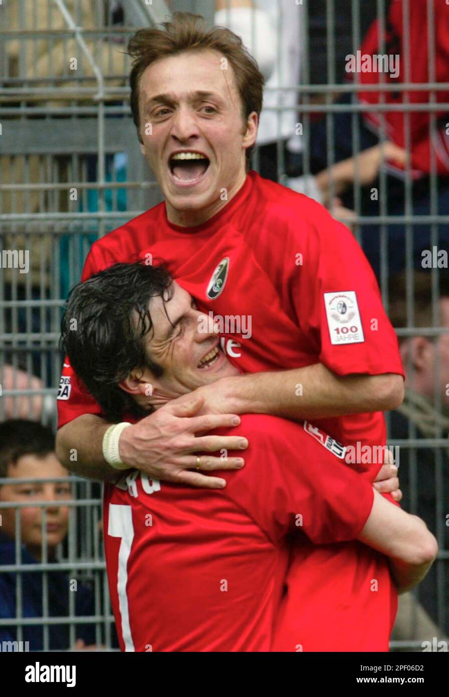 Freiburg's Georgian player Alexander Iashvili celebrates with his teammate  Levan Tsikitishvili from Georgia after scoring during the German first  division soccer match between SC Freiburg and Hannover 96 at Freiburg's  Dreisam stadium,