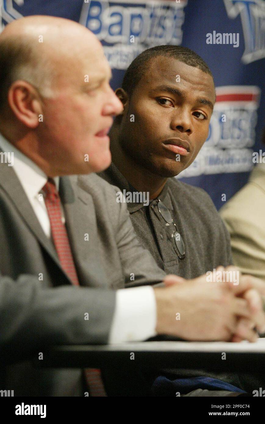 Tennessee Titans top draft pick Ben Troupe, right, a tight end from  Florida, listens as general manager Floyd Reese, left, talks about the  future of the organization during a news conference in