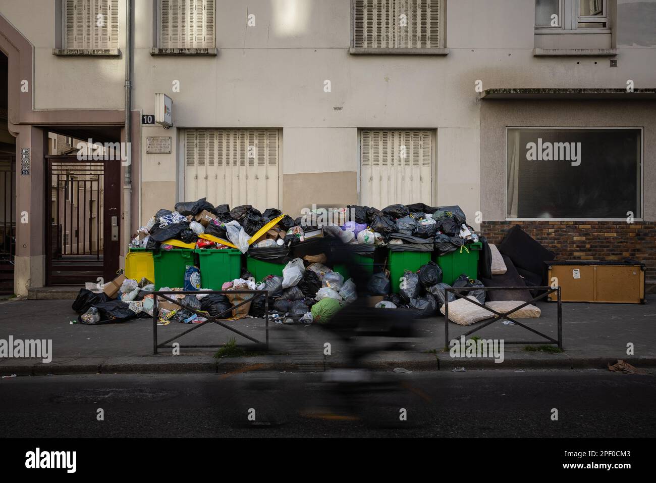 A pile of garbage in front of a building in Paris, France, on March 16