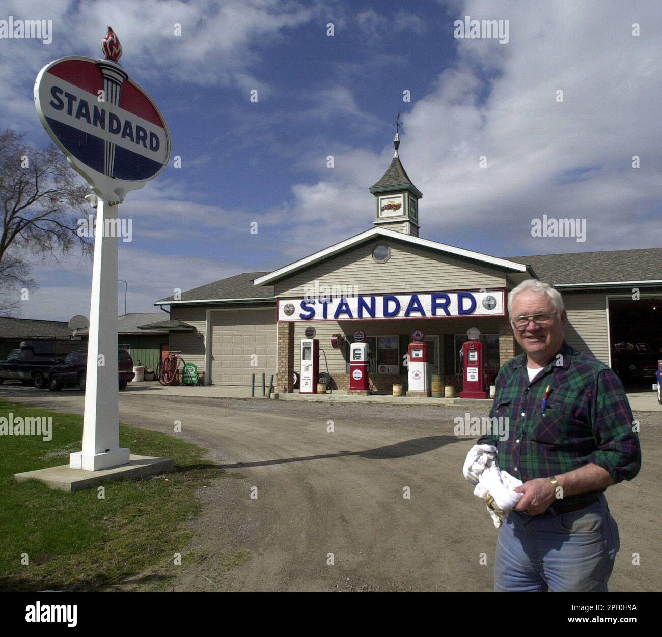Al Reinert, 69, poses in front of his garage in Frankenmuth, Mich