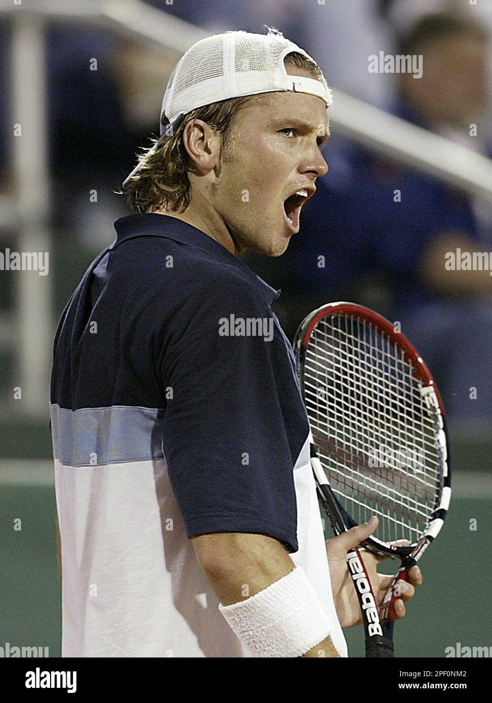 Robert Kendrick reacts after losing a point to Andy Roddick during the U.S.  Men's Clay Court Championships at Westside Tennis Club in Houston,  Wednesday, April 14, 2004. Roddick won 6-2, 6-3. (AP