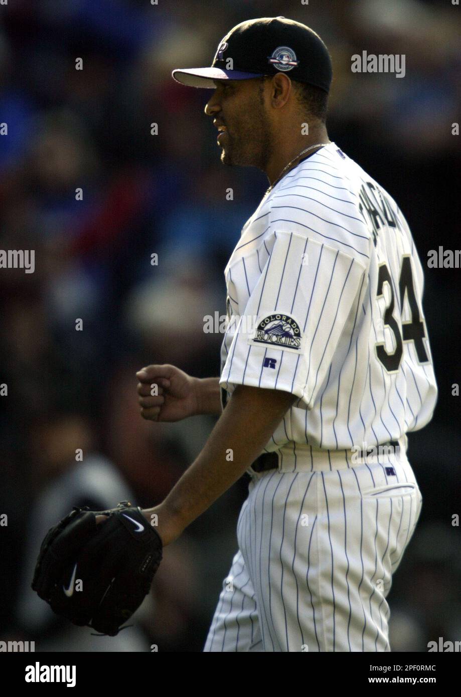 Colorado Rockies relief pitcher Shawn Chacon celebrates the Rockies' 7 ...