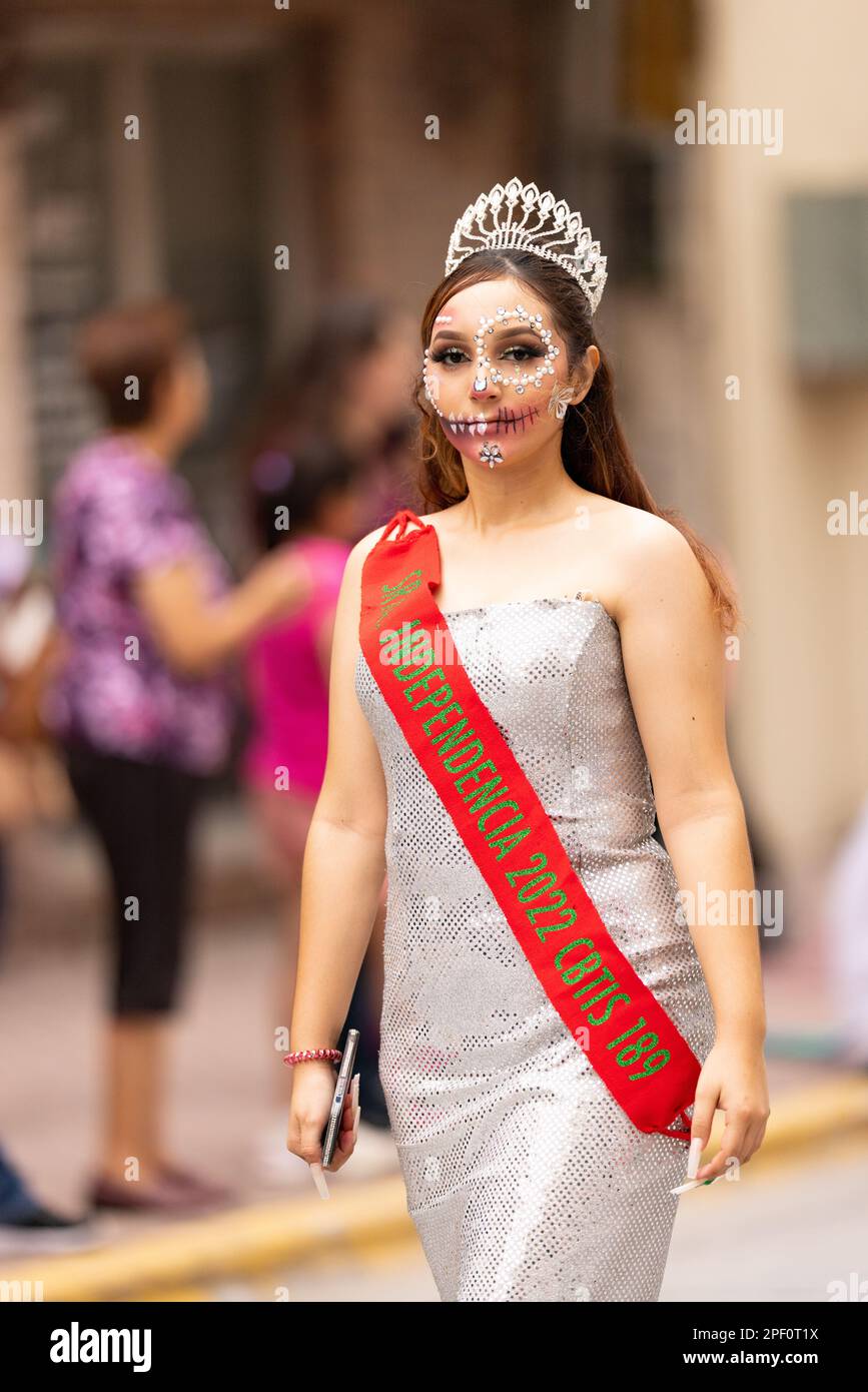 Matamoros, Tamaulipas, Mexico - November 1, 2022: Dia de los Muertos Parade, Beauty queen, wearing a crown and her face painted like a skull Stock Photo