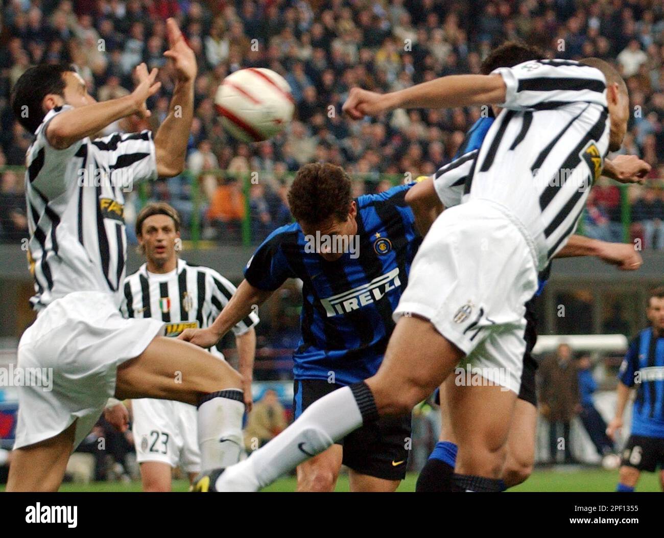 Inter midfielder Kily Gonzalez, left, of Argentina, is chased by Roma  defender Christian Panucci during the Italian first division soccer match  between Inter and Roma at the San Siro stadium in Milan,