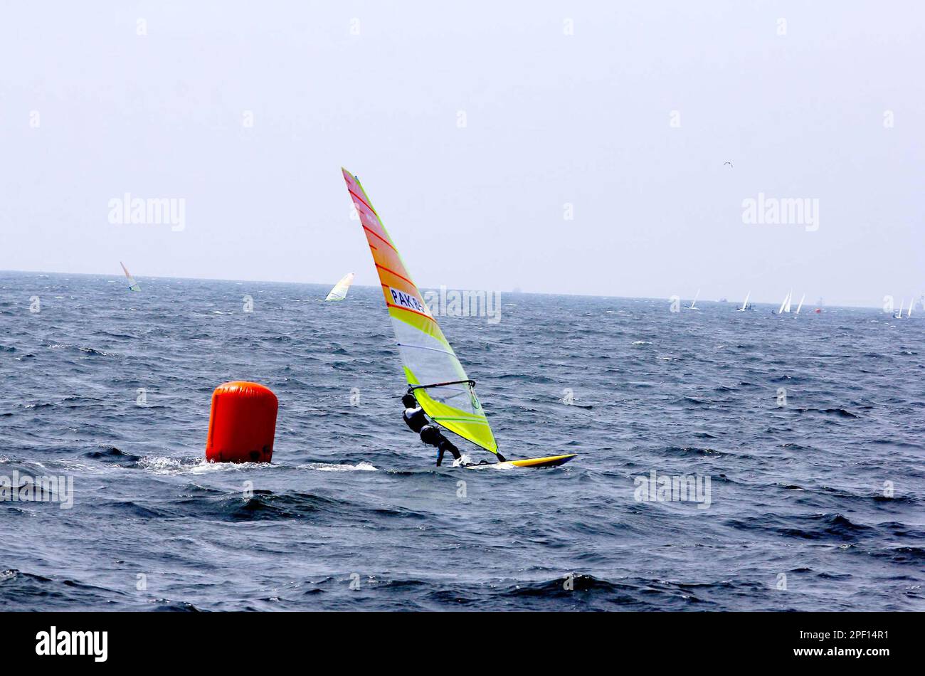 Sailors from different countries take part in sailing race during the