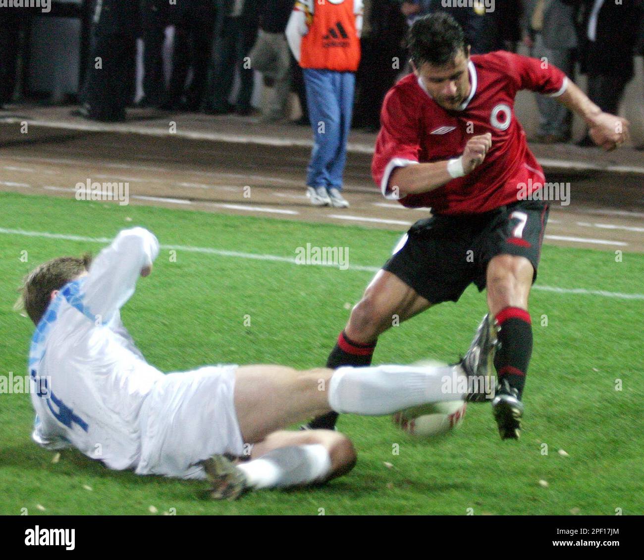 Albania's Edvin Murati, right, fights for the ball with Iceland's Bjarni  Gudjonsson during their friendly international soccer match in Tirana,  Albania, Wednesday March 31, 2004. Albania beat Iceland 2-1. (AP  Photo/Hektor Pustina