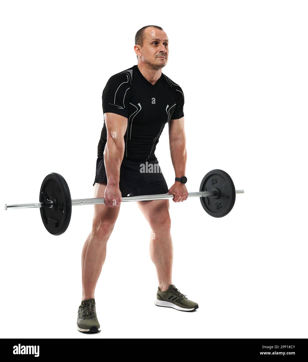 Athletic middle age man doing deadlift fitness workout with barbell, isolated on white background Stock Photo