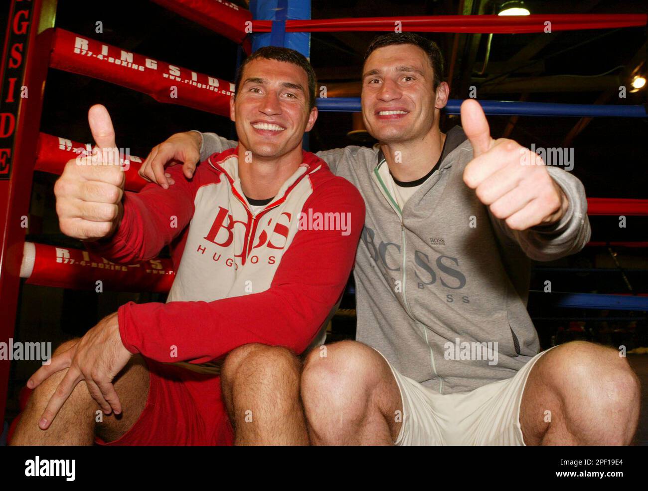 Wladimir Klitschko, left, and his brother, Vitali, of Ukraine, give a