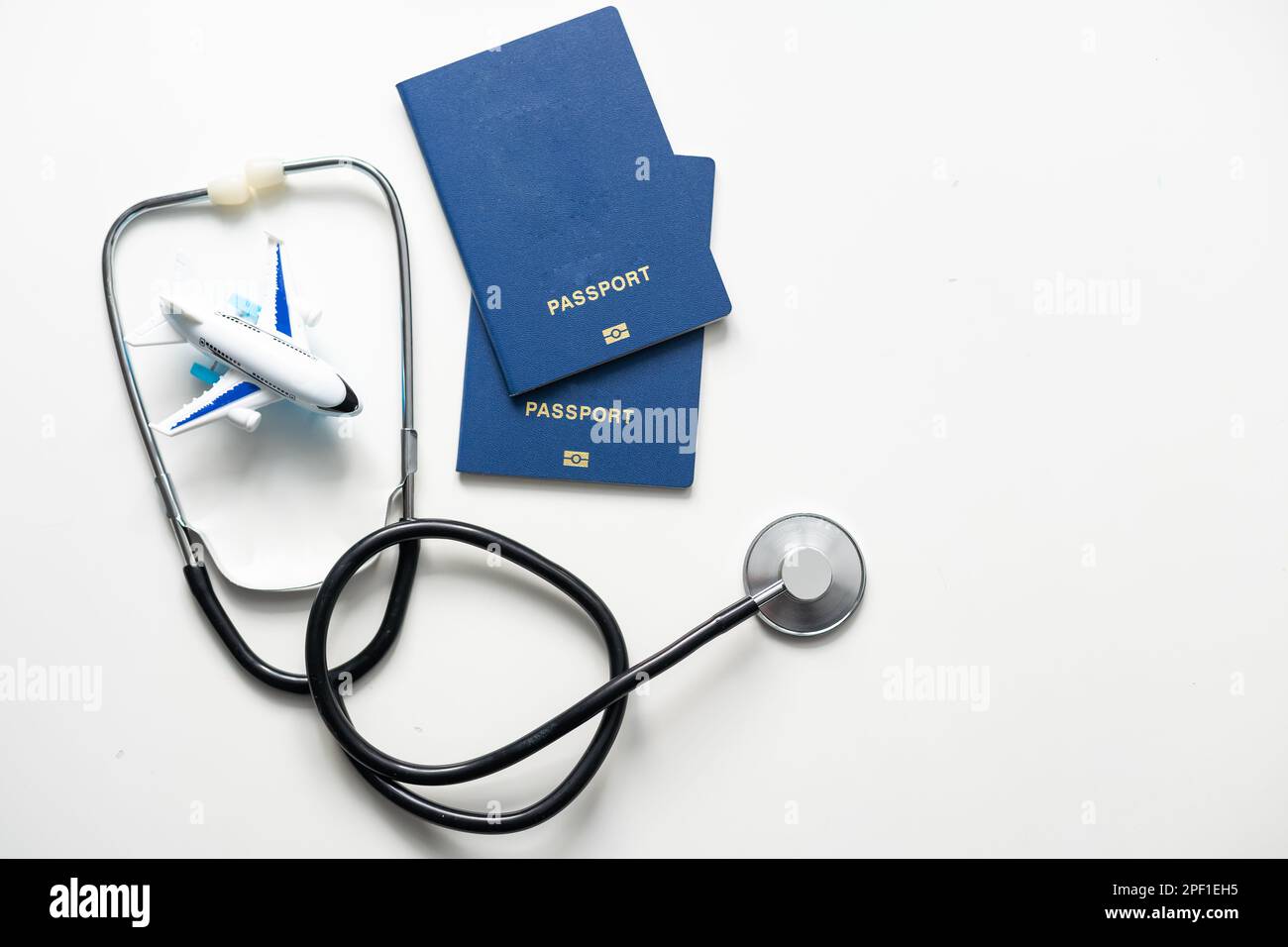Medical Tourism, medical travel concept. Stethoscope, toy plane and