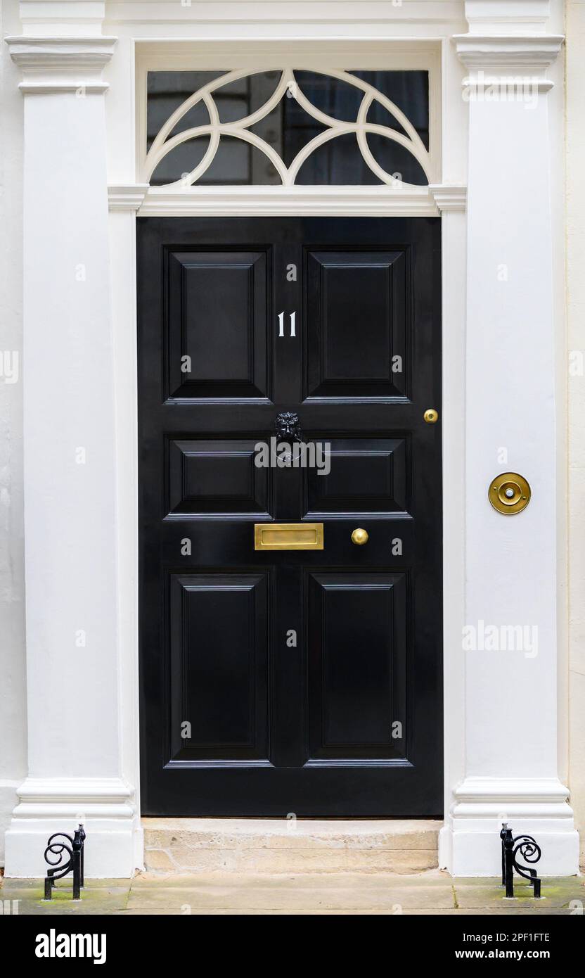 Door of 11 Downing Street, official residence of the Chancellor of the Exchequer (UK finance minister) Westminster, London, UK Stock Photo