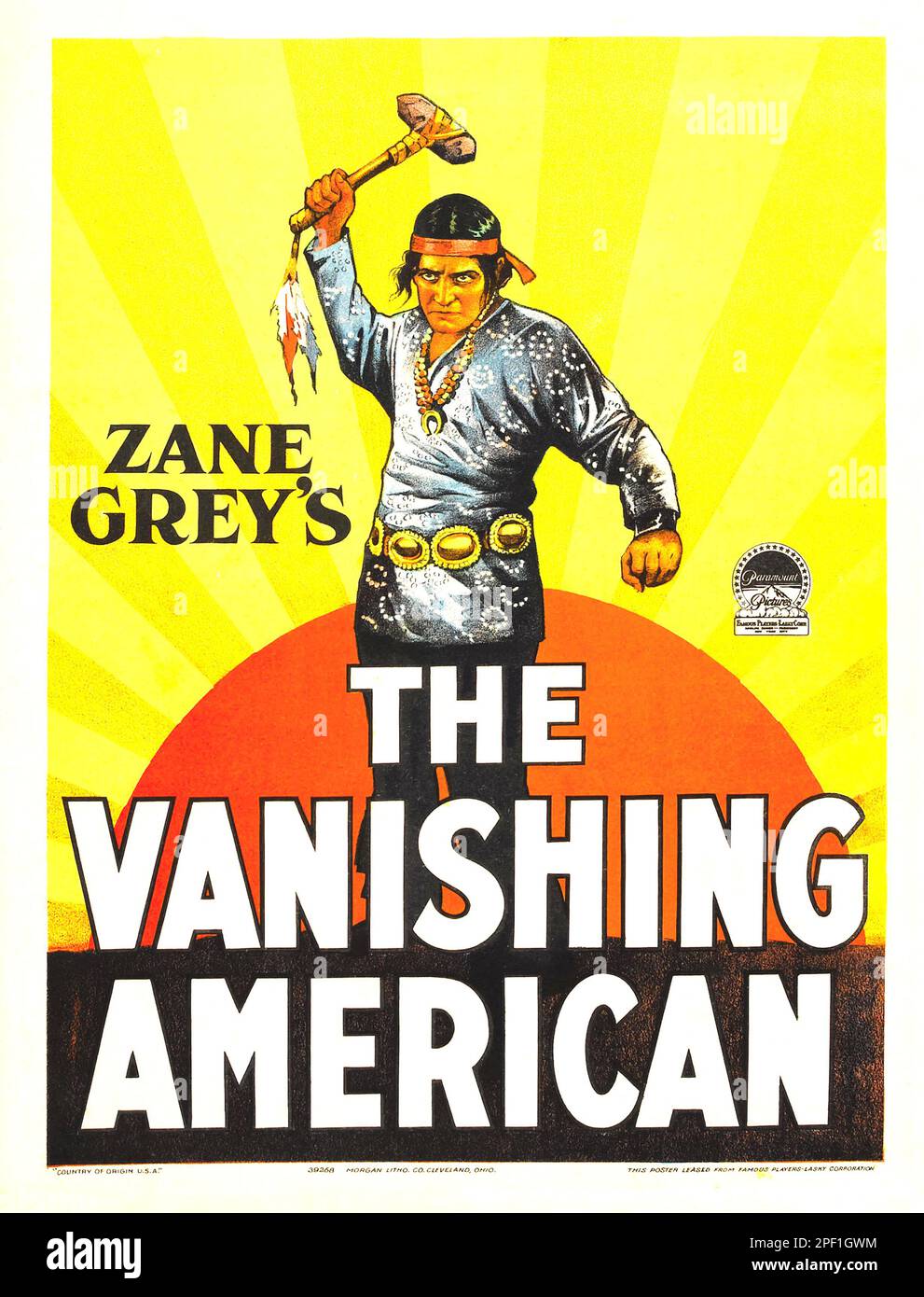 Zane Grey's The Vanishing American - 1925 - A native American approaches tomahawk in hand. Stock Photo