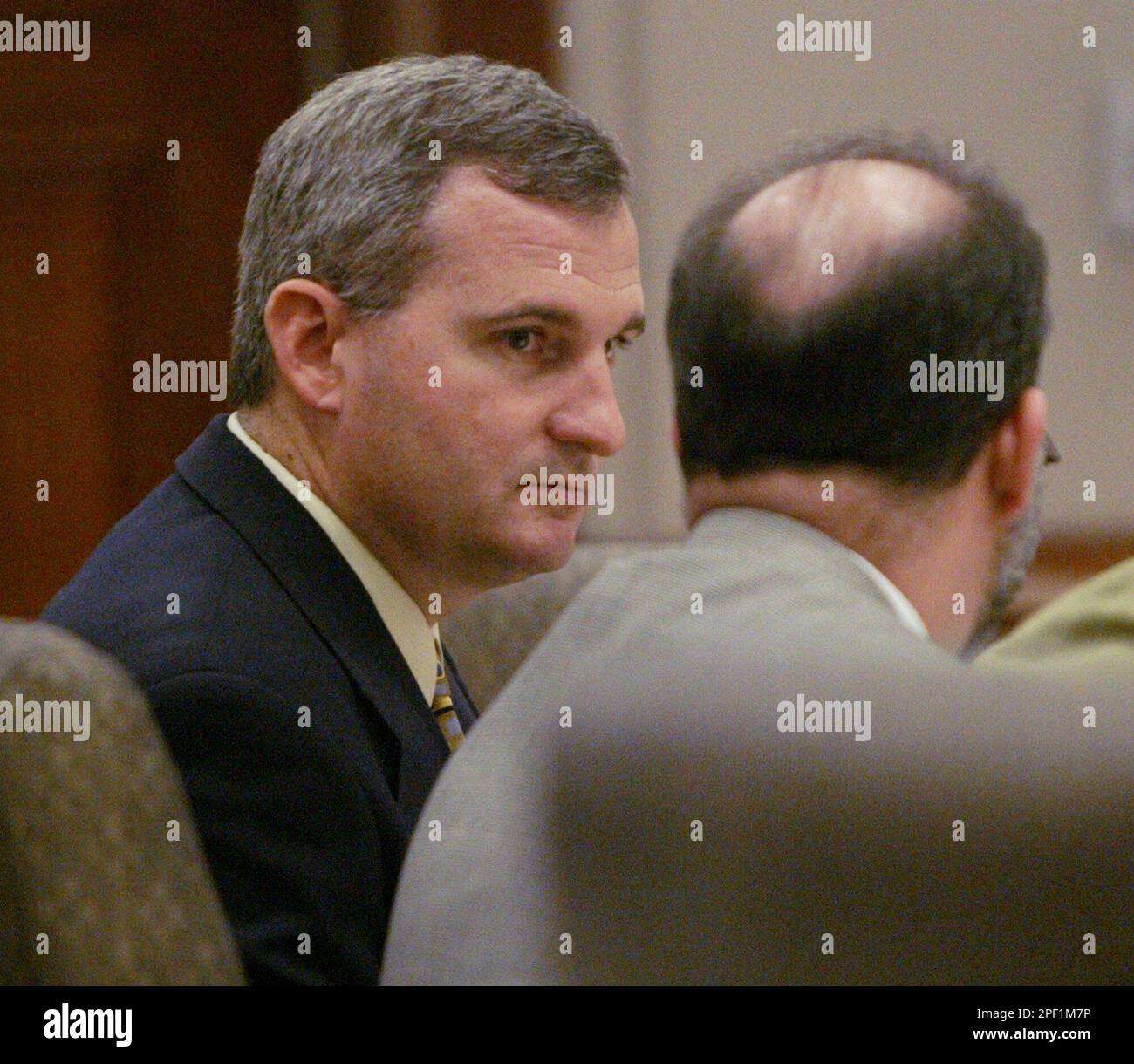 Michael Blagg, Left, Listens To Ken Singer, One Of His Attorneys 