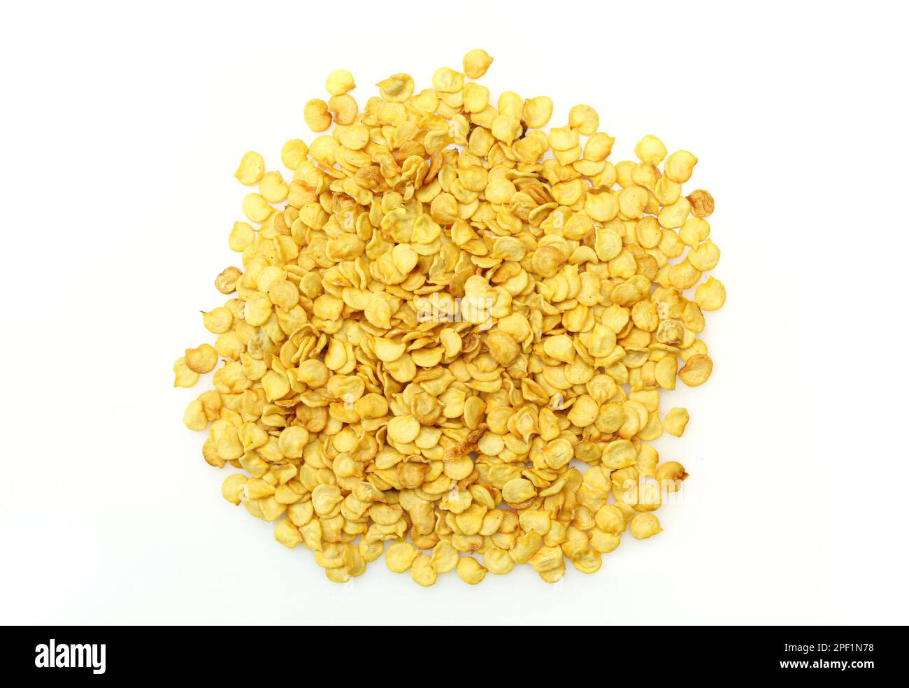 Pile of clean chilli seeds isolated on white background. Dry chili pepper flakes Stock Photo