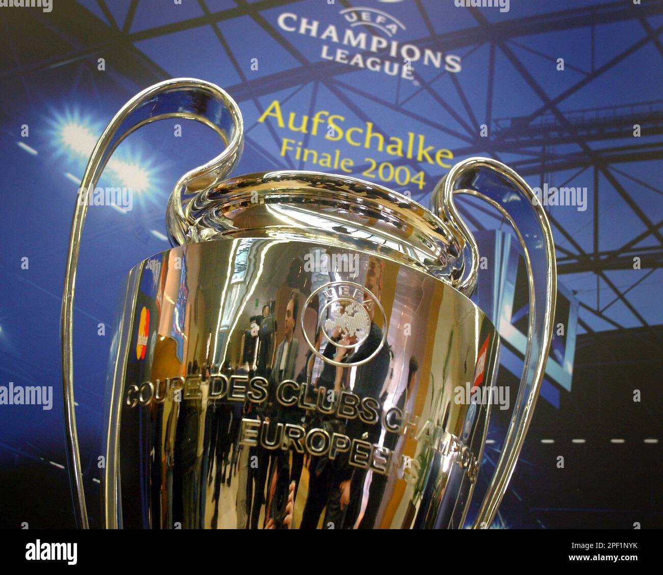 The UEFA Champions League Cup is displayed during the drawing for