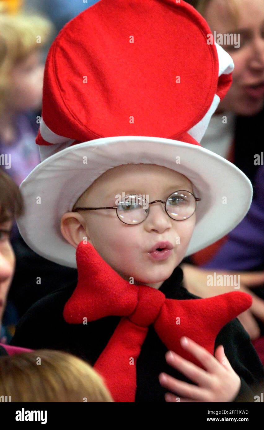 Gustin Wolf, 4, of Little Chute, Wis., dons his Dr. Seuss hat and bow