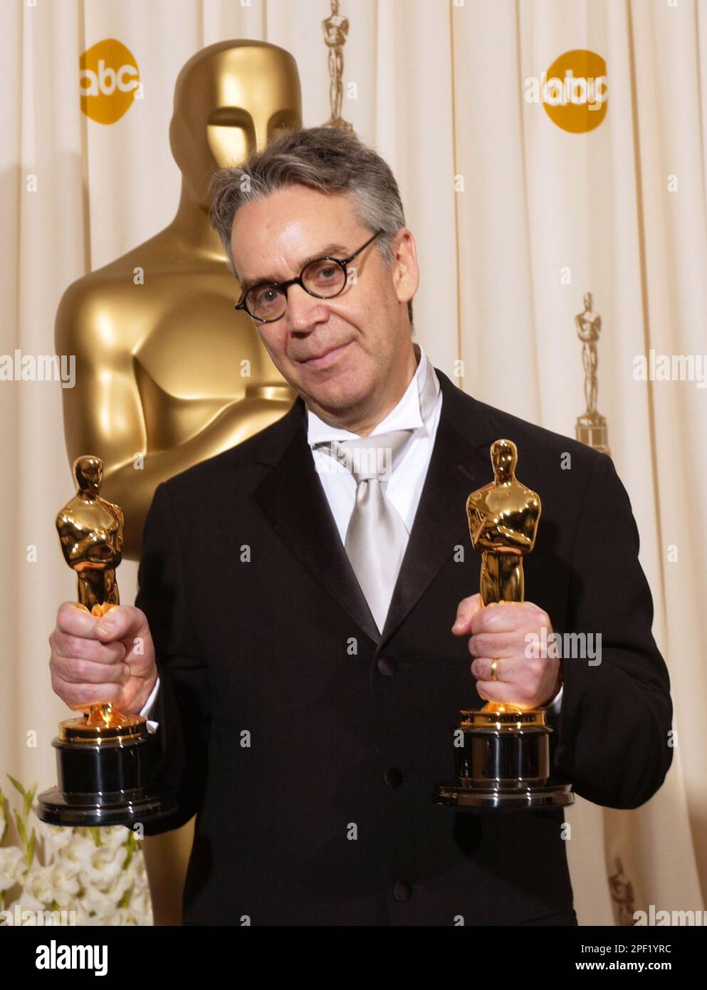 Howard Shore holds the Oscars he won for best original score for his work  on The Lord of the Rings: The Return of the King and best original song for  Into the