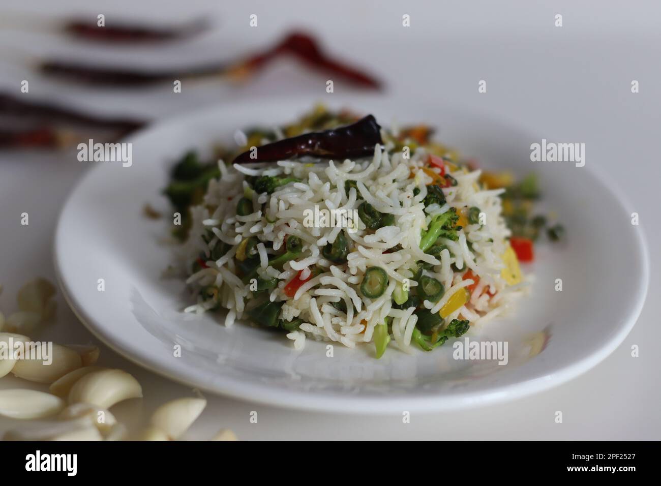 Chili garlic veg rice. Chilli garlic mix vegetable rice. A garlic