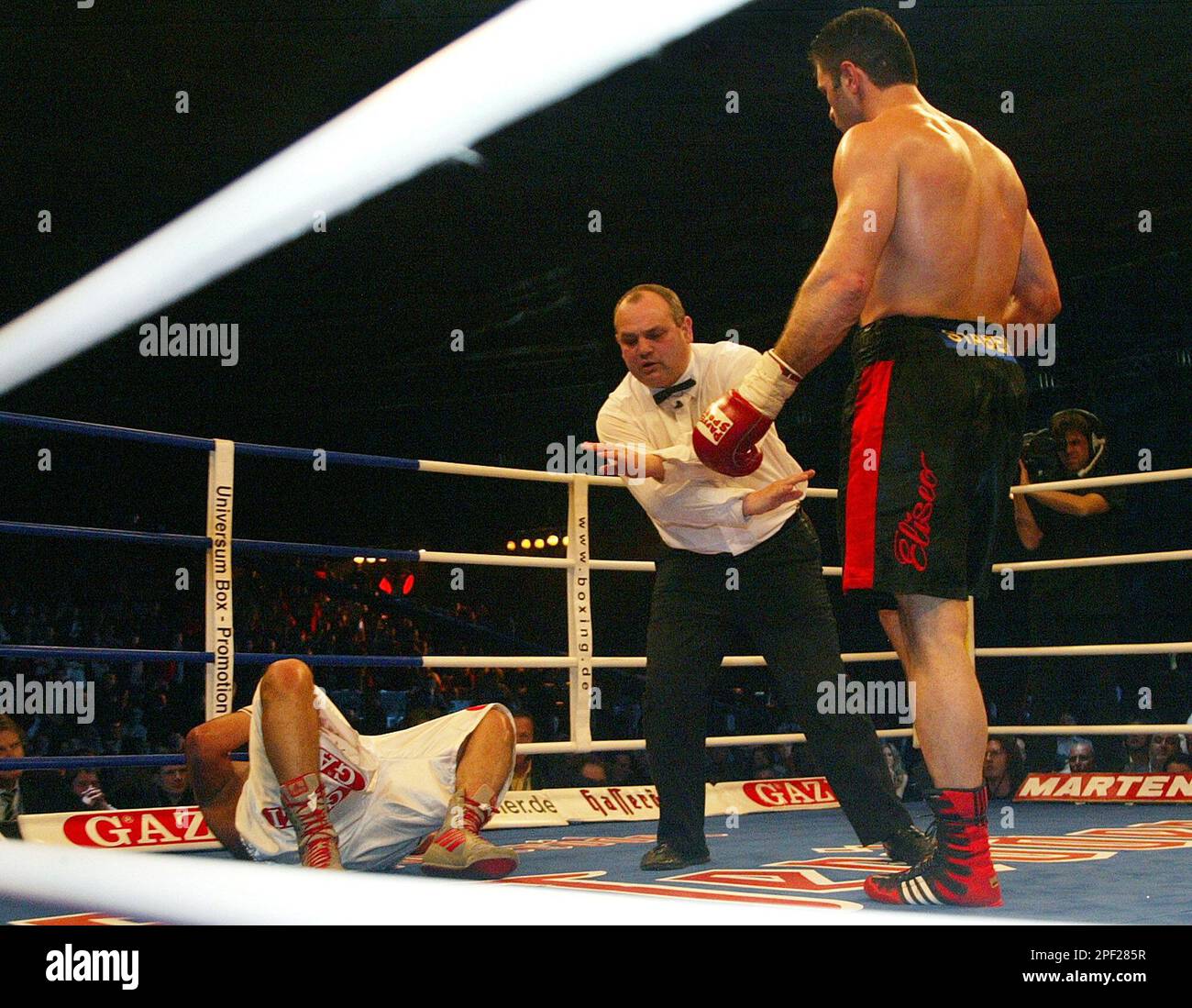 German boxer Luan Krasniqi, right, looks to referee Richie Davis from ...