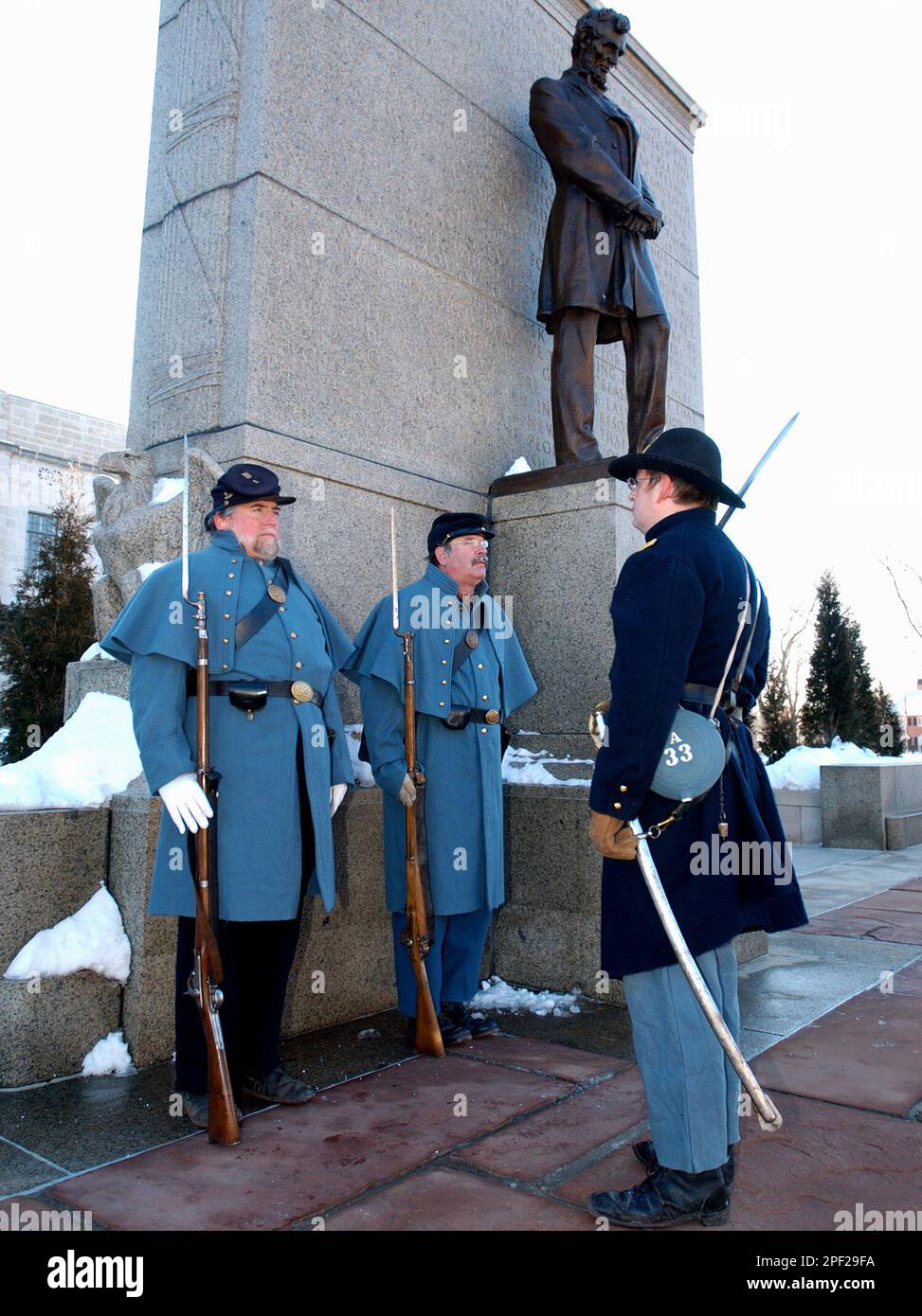 Capt. Keith Rockefeller, right, of Tecumseh, Neb., chaplain of the ...