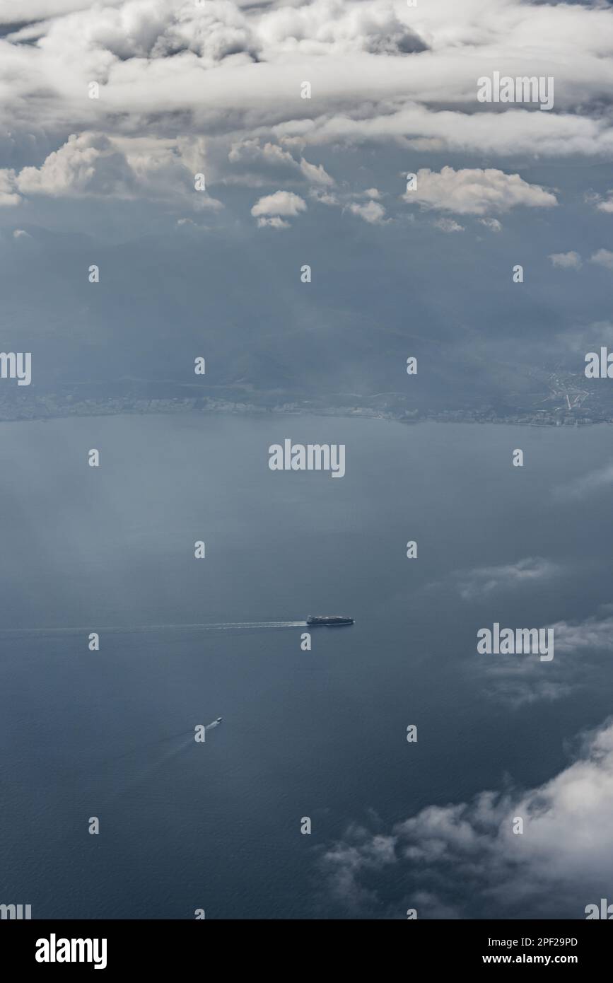 Voyage of some ships seen from the air at a high altitude. Vector cotton texture background Stock Photo