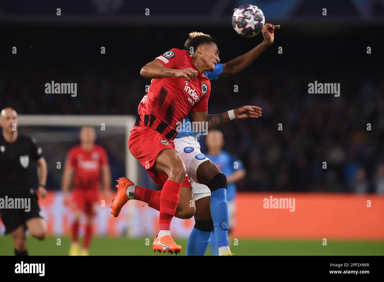 Naples, Italy. 15 Mar, 2023. Tuta of Eintracht Frankfurt competes for the  ball with Victor Osimhen of SSC Napoli during the Uefa Champions League  match between SSC Napoli and Eintracht Frankfurt at