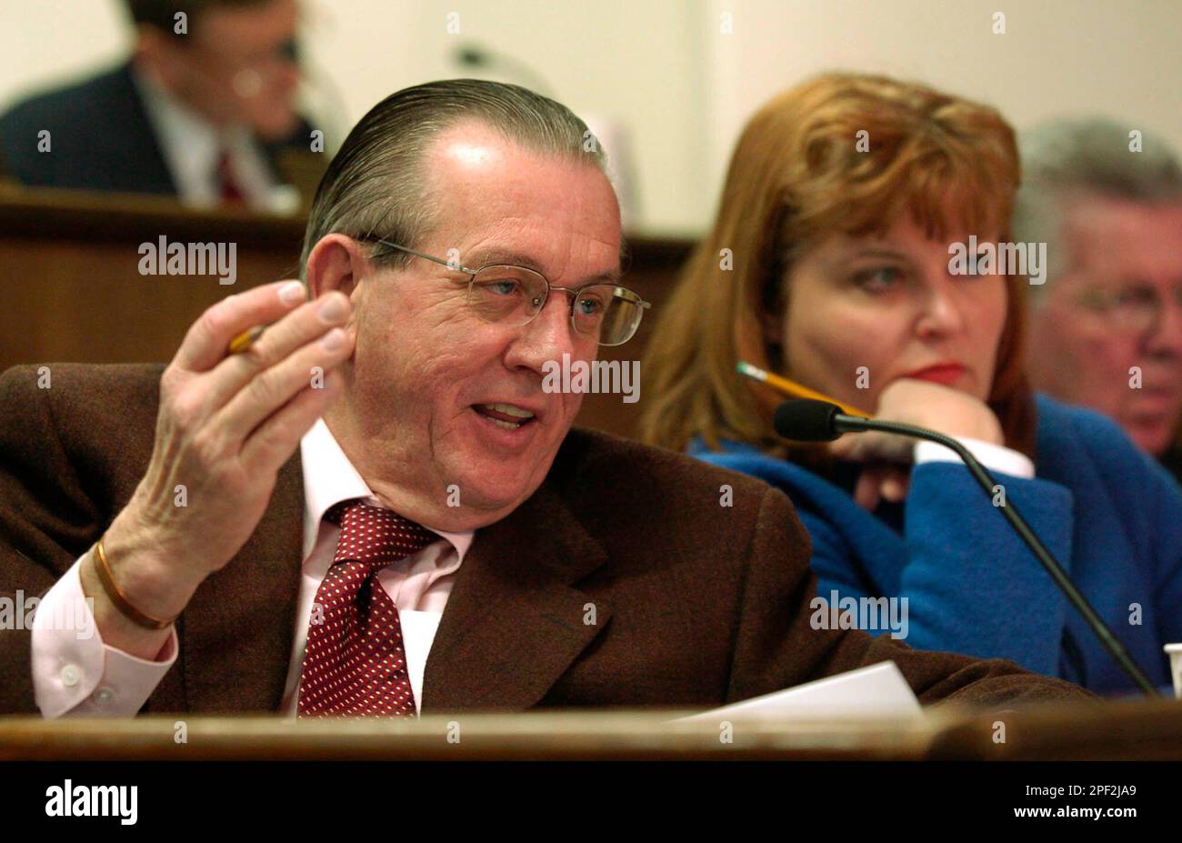Louisville Democrats House Speaker Pro Tem Larry Clark, left, and Rep.  Charles Miller talk on the House floor during the legislative session in  Frankfort, Ky., Wednesday, March 16, 2011. (AP Photo Stock