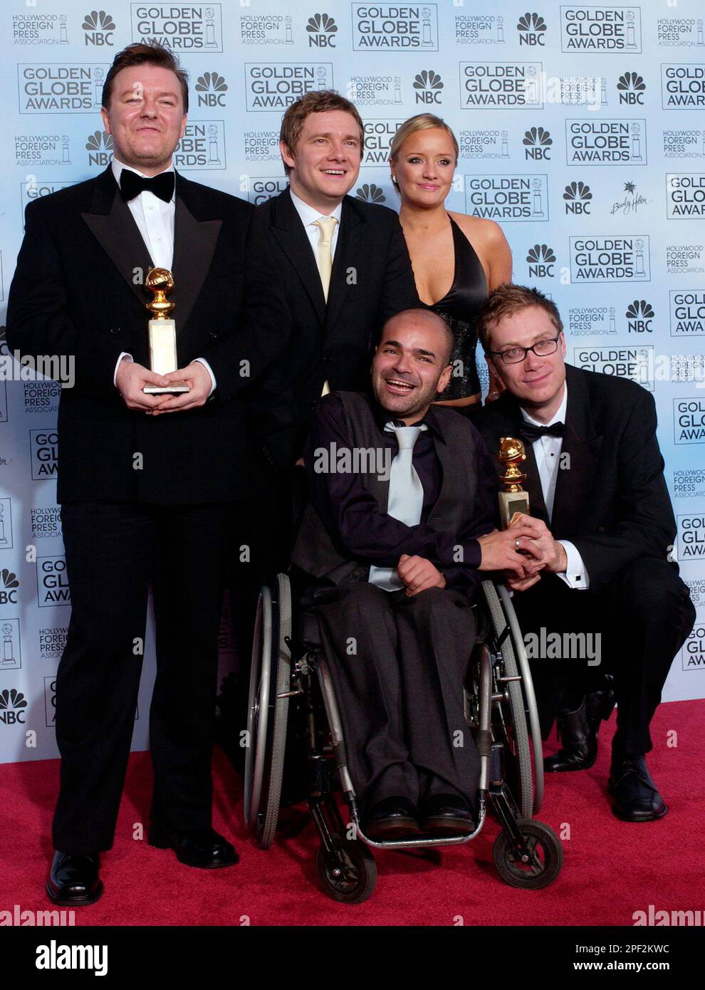 The cast of "The Office" Ricky Gervais, left, Stephen Merchant, Ash