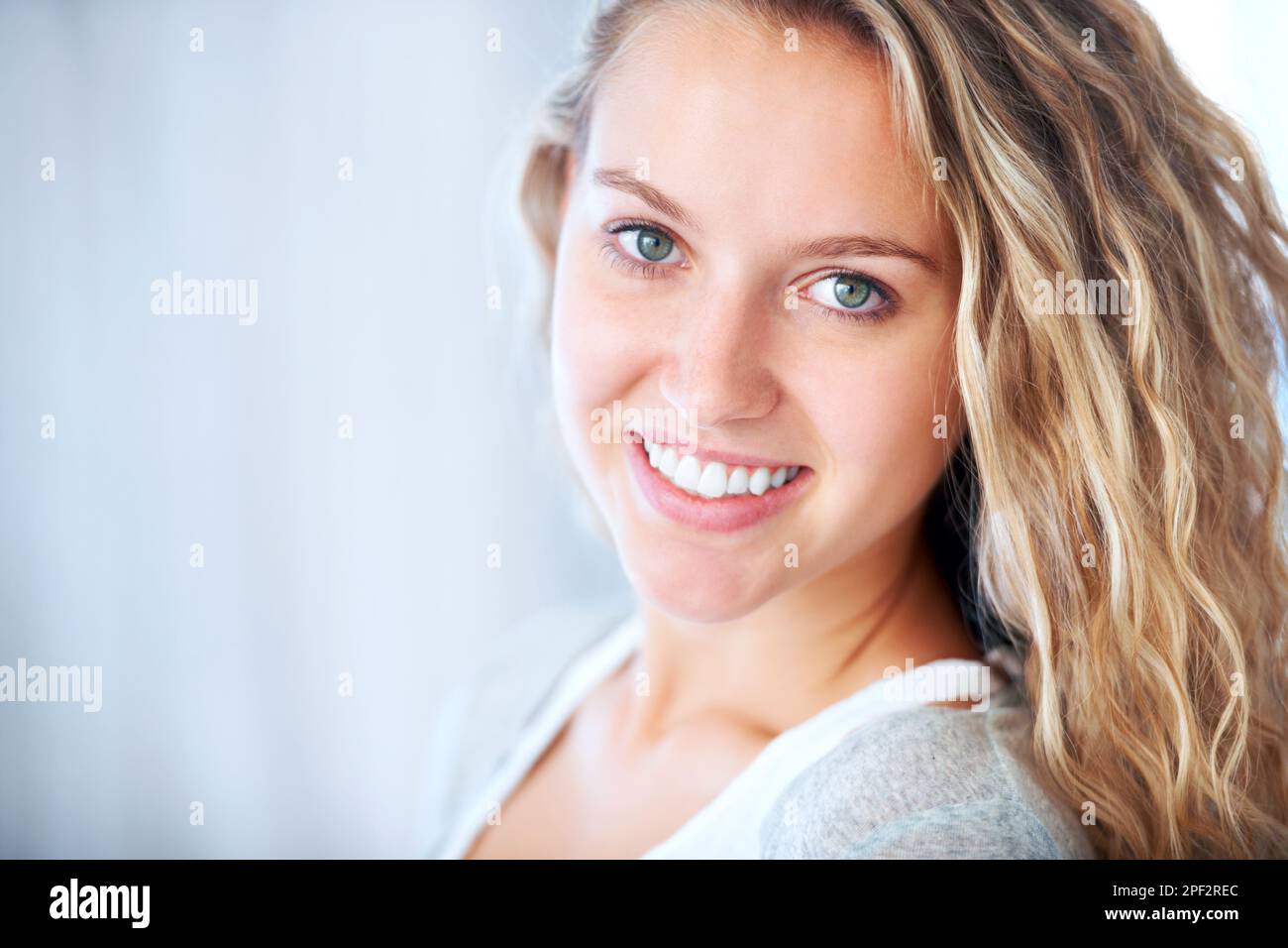 Wholesome and beautiful. A striking young blonde feeling free and relaxed - Copyspace. Stock Photo