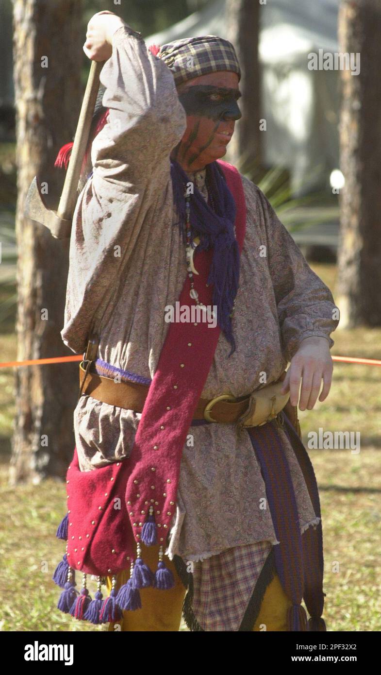 Daniel Murray practices throwing a tomahawk at the 23rd Annual