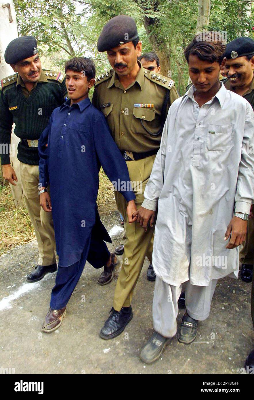 Indian Border Security Force soldiers take back Pakistani brothers