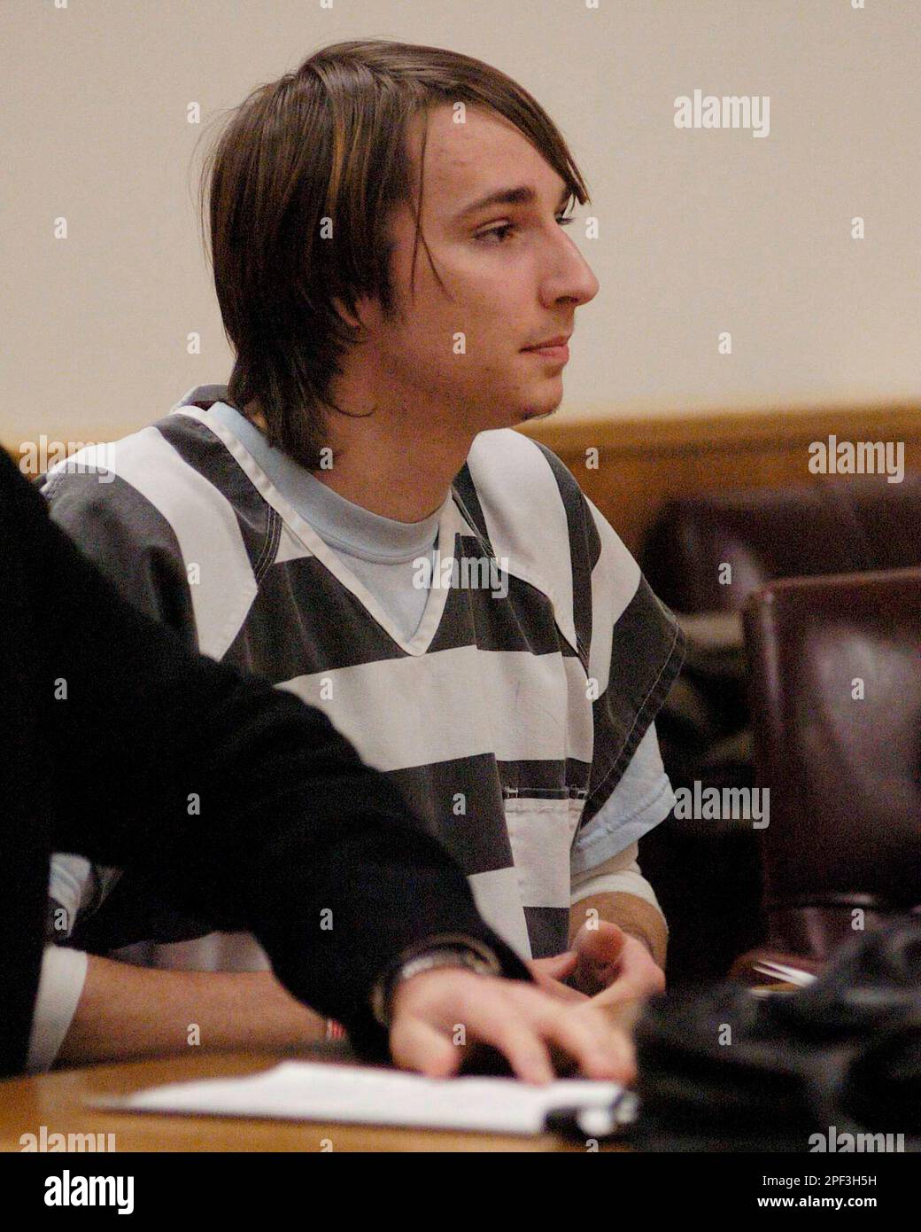 Aaron Lee Skeen looks on during a hearing Monday, Dec. 1, 2003, in