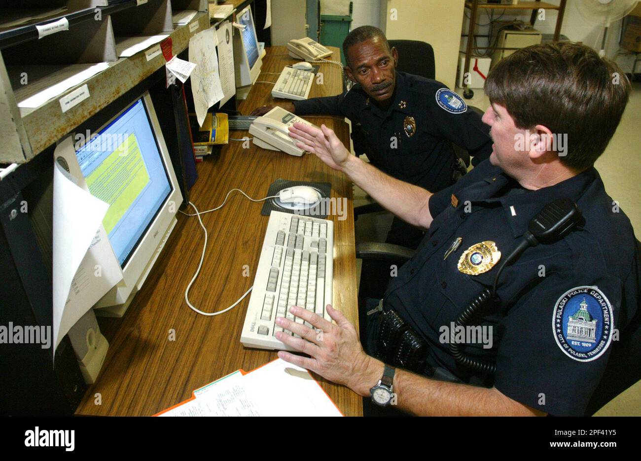 New Pulaski Police Department police chief John T. Reynolds, left