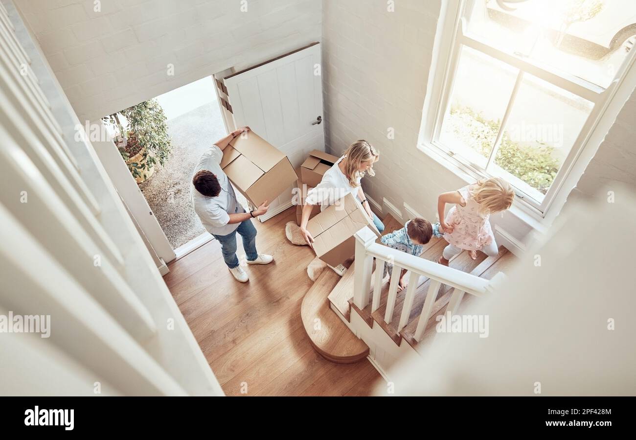 Above view happy caucasian family moving into their new home and ...