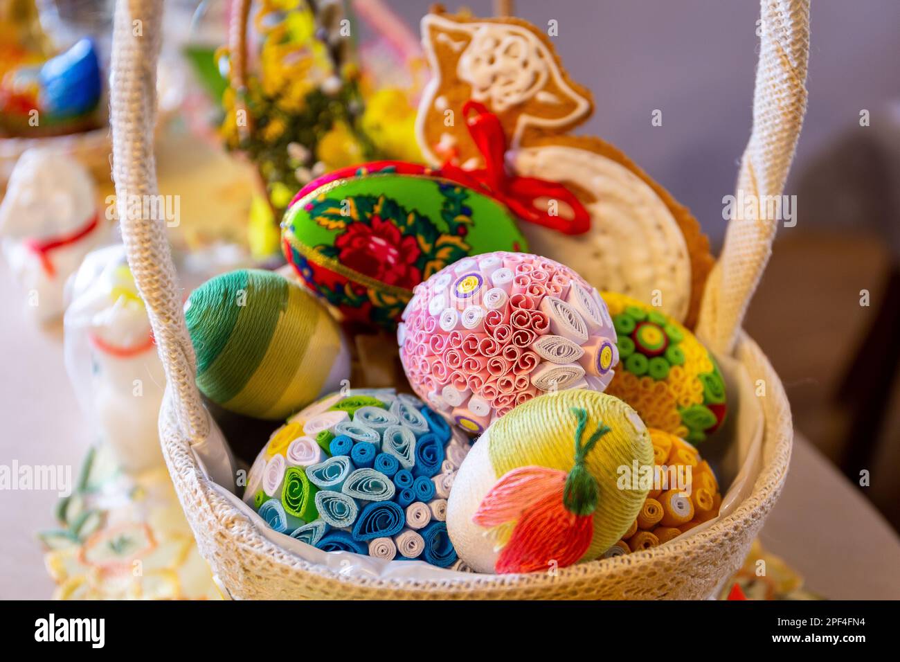 Traditional Easter basket with colorful handmade Easter origami eggs