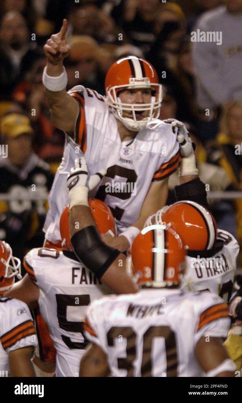 Cleveland Browns quarterback Tim Couch celebrates after scoring on a 9-yard  run late in the first half Sunday night, Oct. 5, 2003, against the  Pittsburgh Steelers in Pittsburgh. Couch, demoted to being