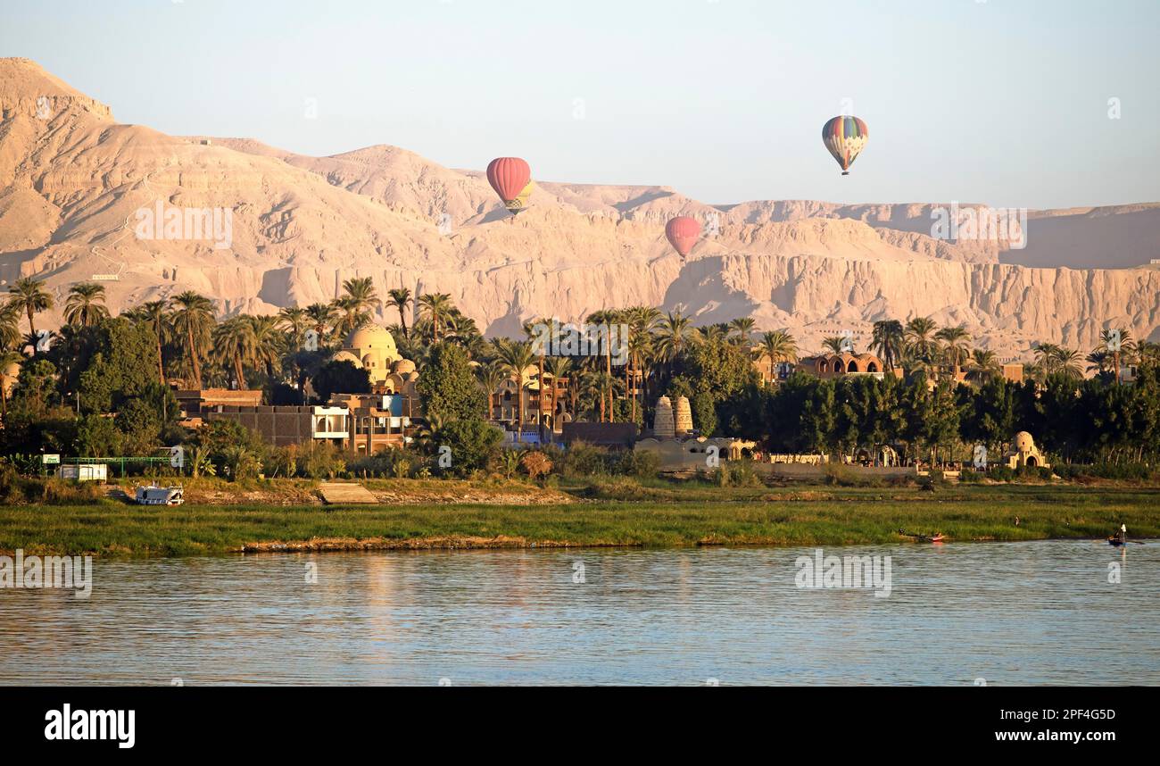 Hot air balloons in Luxor, Eastern Desert behind, Egypt Stock Photo