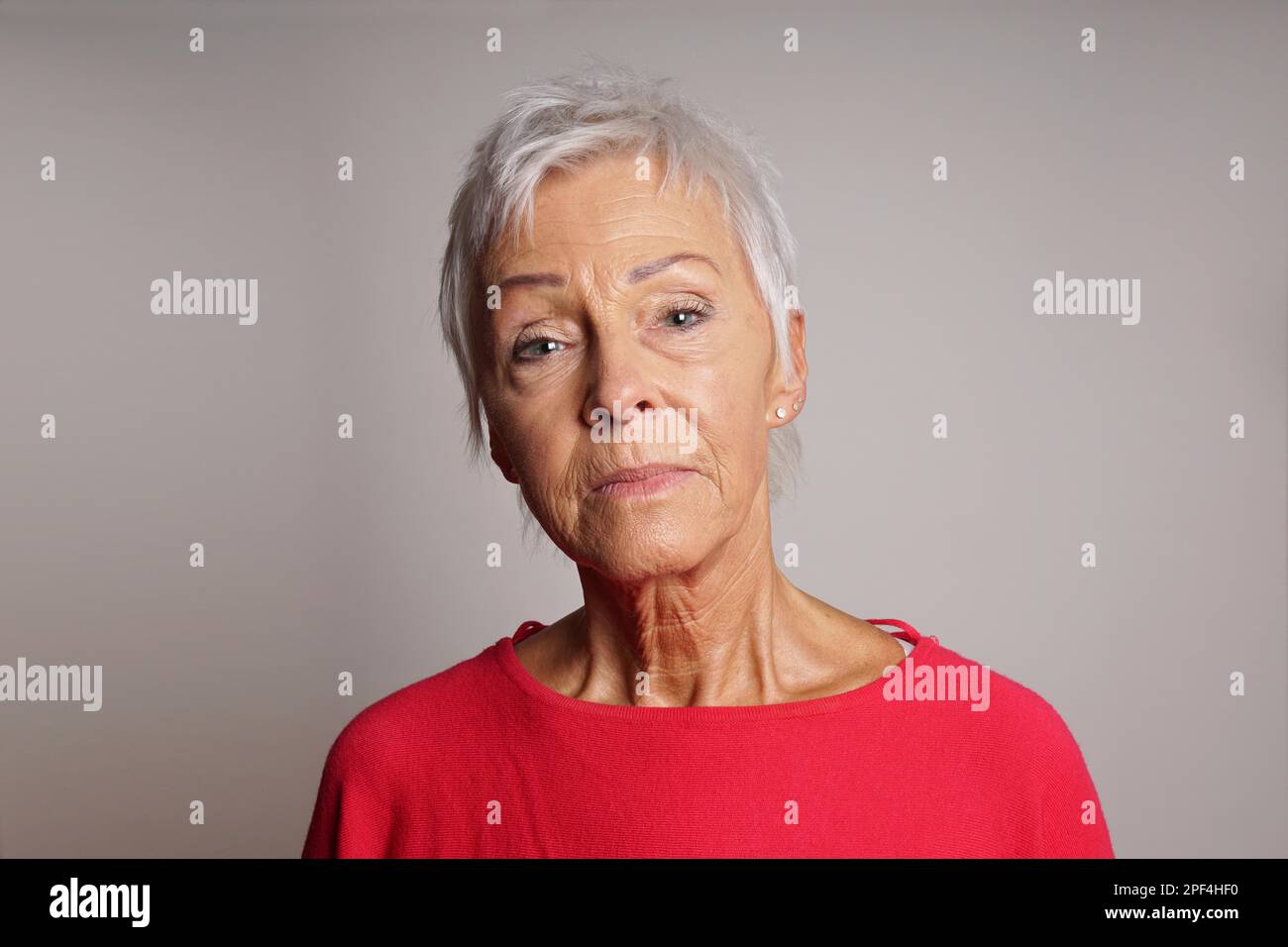 serious mature woman with her head held high Stock Photo Alamy