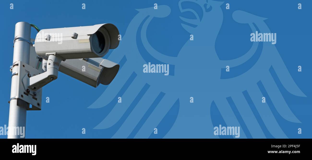 Surveillance state Modern surveillance cameras with German eagle in